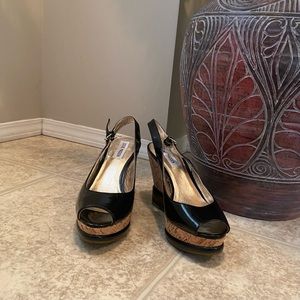 Steve Madden women black faux leather cork platform peep toe heels. Size 9. NWOT